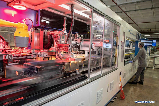 An Employee works in the factory of HT Solar Energy in Istanbul, Turkey, on May 7, 2021. Turkey and China are mutually benefiting from each other's advantages in the field of solar panel production. (Photo by Osman Orsal/Xinhua)